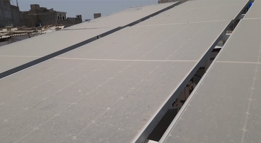 Heavy dust on rooftop panels before solar panel cleaning Las Vegas NV